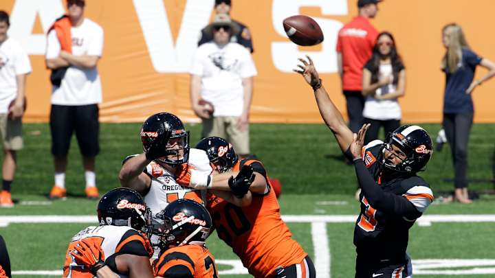 Inexperienced QB trio battles for Beavers' starting role