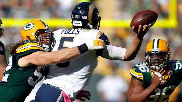 Packers' defense backs Rodgers in 24-10 win over Rams