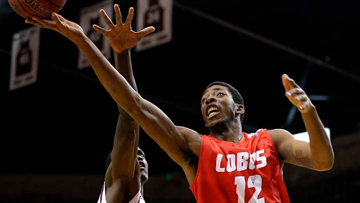 New Mexico forward Devon Williams (neck) taken off court on stretcher