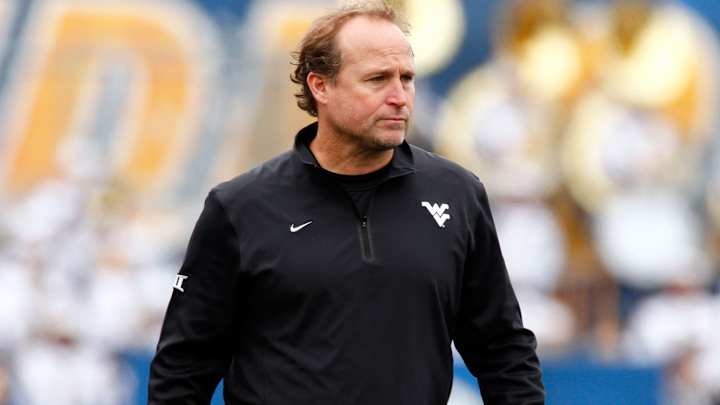 West Virginia head coach Dana Holgorsen will return in 2016