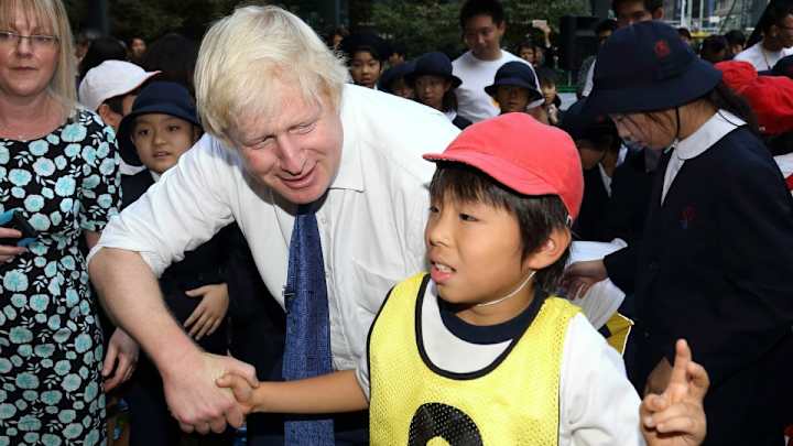 London mayor Boris Johnson bowls over 10-year-old while playing rugby London mayor Boris Johnson bowls over 10-year-old while playing rugby