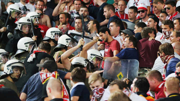 Fans, police clash before Bayern Munich vs. Olympiakos match Fans, police clash before Bayern Munich vs. Olympiakos match