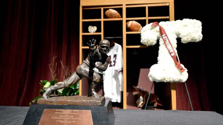 Hundreds gather to pay tribute to A&M Heisman Trophy-winner
