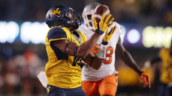 No. 21 Oklahoma State beats WVU 33-26 in overtime