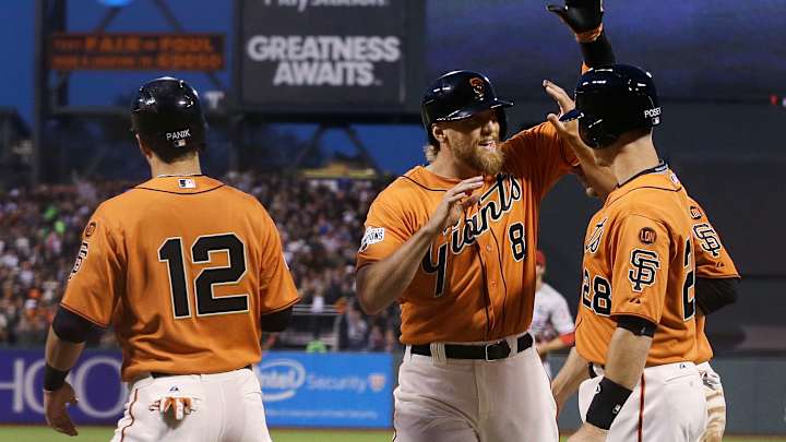 Pence slam among 22 hits for Giants in 15-2 win