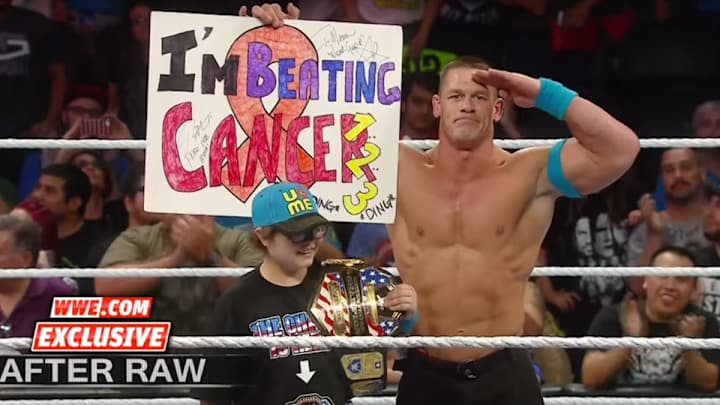 Watch: John Cena welcomes young fan battling cancer into ring