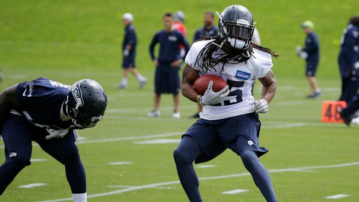 Stars missing for various reasons as Seahawks open OTAs