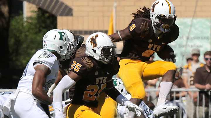 Roback, Vann lead Eastern Michigan past Wyoming, 48-29