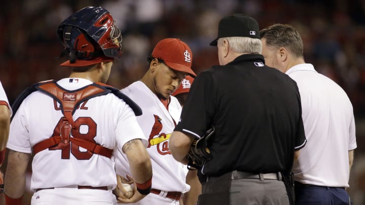 Cards' Martinez lifted after 7 pitches with apparent injury
