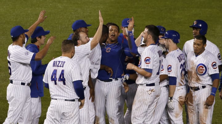 Castro's RBI single in 9th lifts Cubs past Reds