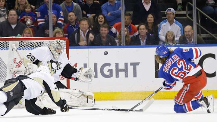 Rangers advance on Hagelin's OT goal, 2-1