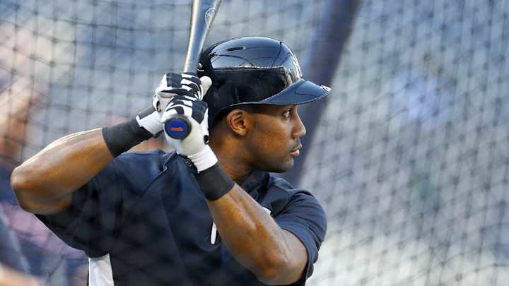 The Yankees' Chris Young struck out against a pitching machine