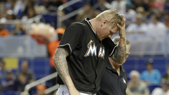 Marlins' Latos leaves game after being hit in leg by liner