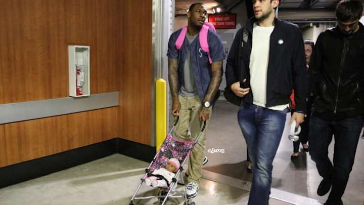 Lakers' rookies have to carry dolls to every game