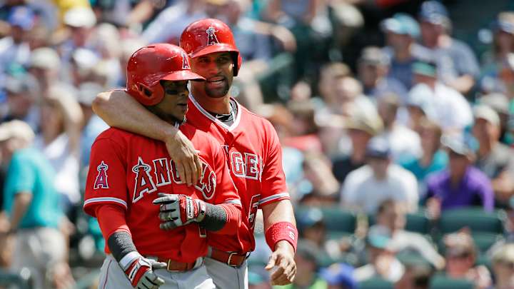 Angels move into 1st place in AL West, beat Seattle 10-3
