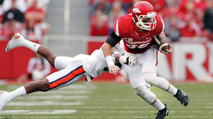 Arkansas prevails over Auburn in four-overtime battle of disappointments