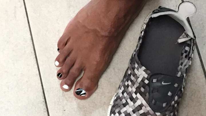 Providence coach Ed Cooley painted his toe nails in team colors Providence coach Ed Cooley painted his toe nails in team colors