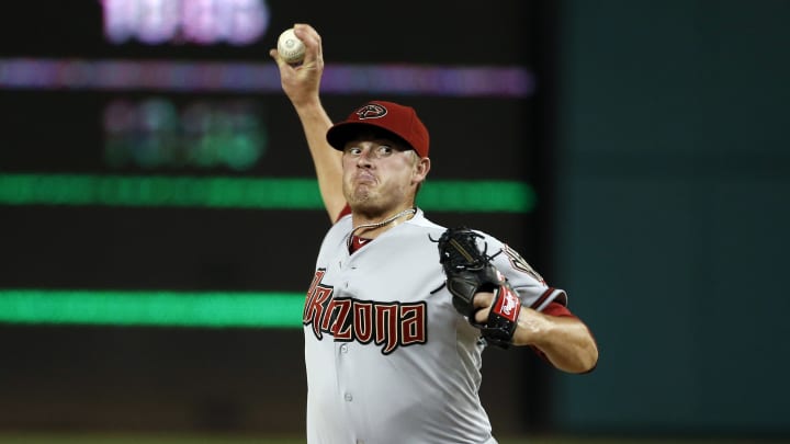 AP source: D-backs agree to trade reliever Reed to Mets