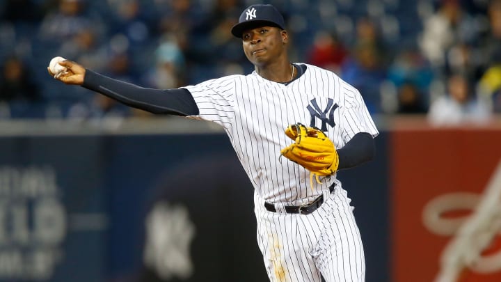 Alex Rodriguez coaches Yankees shortstop Didi Gregorius on defense