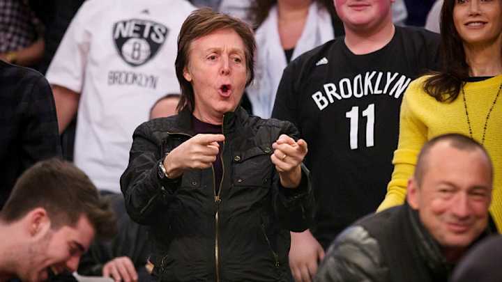 Paul McCartney caught a T-shirt at a Nets game Paul McCartney caught a T-shirt at a Nets game
