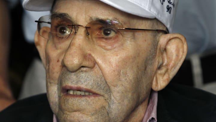 Berra celebrates 90th with return of rings, trophies