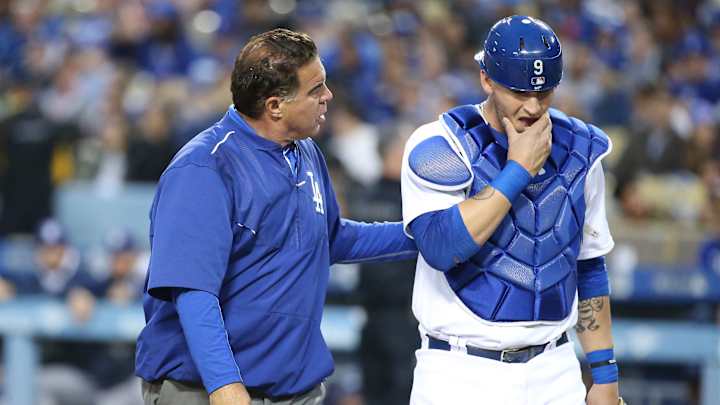 Dodgers place catcher Yasmani Grandal (concussion) on 7-day DL