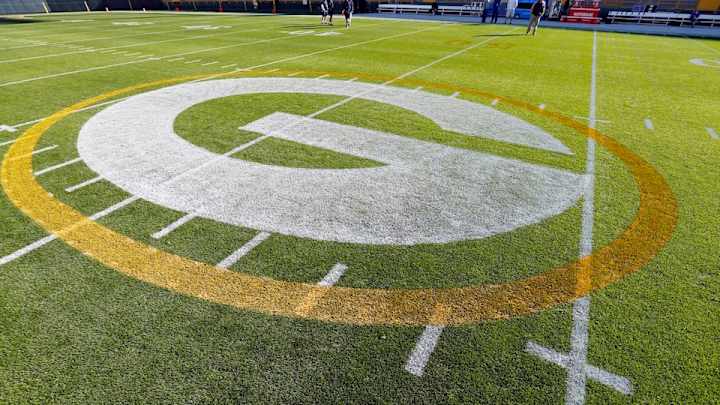 Fan dressed as Waldo from “Where’s Waldo?” in front row at Lambeau