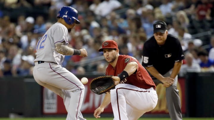 Effectively-wild Bradley leads Arizona to 8-5 win over Texas