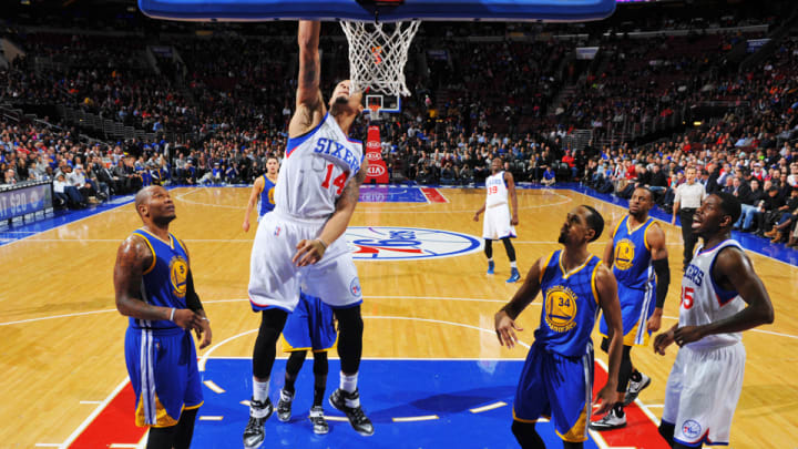 Watch: 76ers guard K.J. McDaniels uses backboard for a self alley-oop