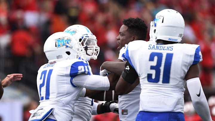 High-octane Western Kentucky beats Middle Tennessee 58-28