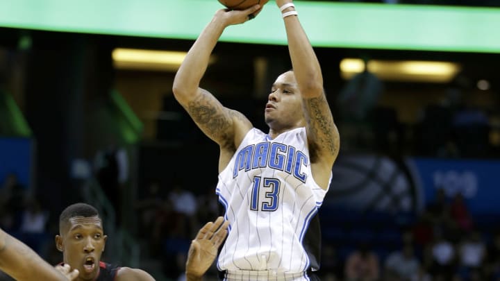 Napier carries Magic past Heat in overtime, 95-92