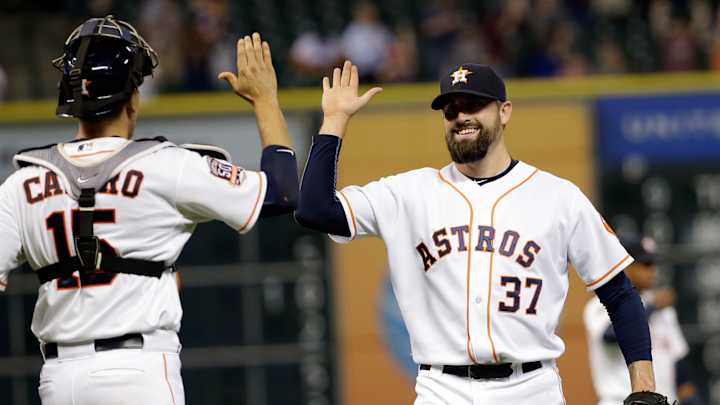 Carter, Rasmus homer to back Hernandez as Astros beat A's