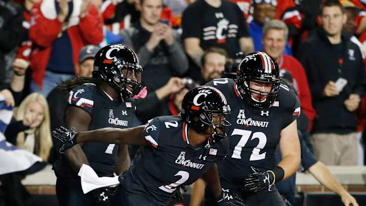 Moore throws for 2 TDs, Cincinnati beats Miami 34-23 Moore throws for 2 TDs, Cincinnati beats Miami 34-23