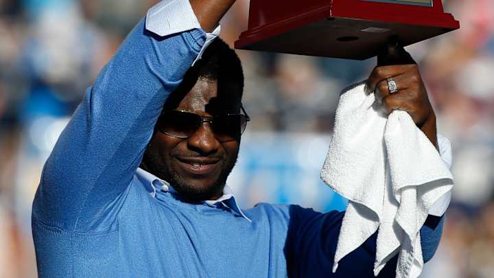 Houston's pick-6, Poe's TD run carry Chiefs over Chargers