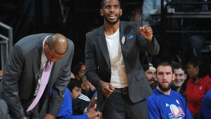 Injured Chris Paul works out on court for Clippers