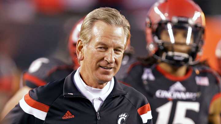 Report: Cincinnati's Tommy Tuberville may withhold money from players