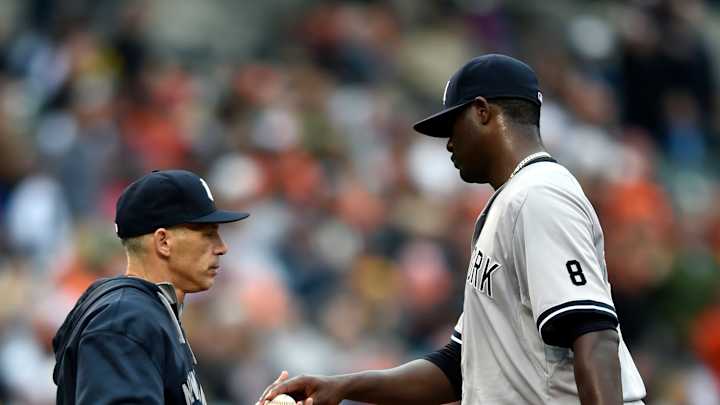 Yankees lose to Orioles 9-4 but open playoffs at home