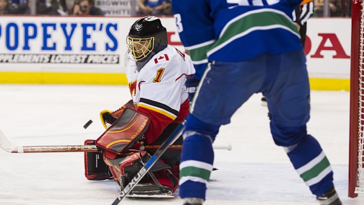 Flames stage third-period rally to down Canucks in Game 1 Flames stage third-period rally to down Canucks in Game 1