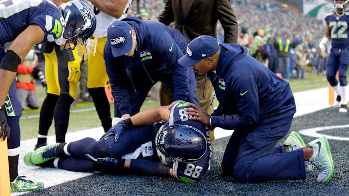 Big day by Wilson comes with loss of Graham for Seahawks