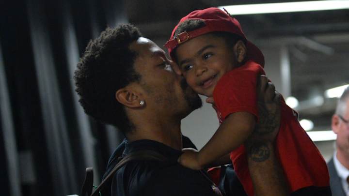 Proud father Derrick Rose wore a T-shirt with his son’s meme on it