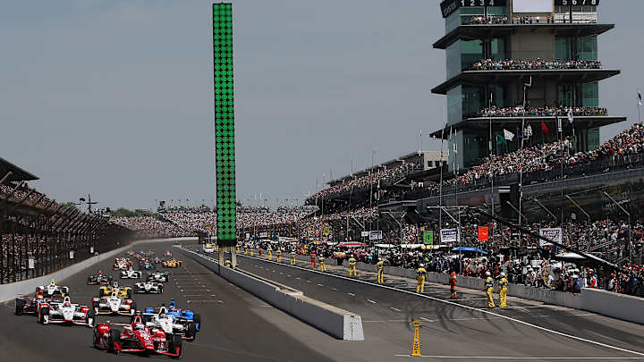 Two pit crew members struck by car during Indy 500 Two pit crew members struck by car during Indy 500