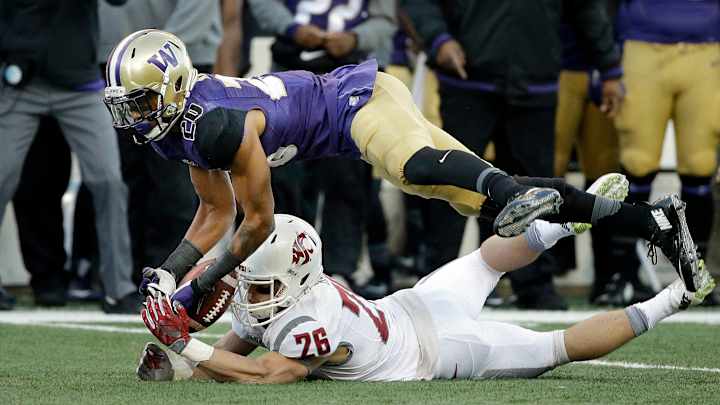 Washington knocks off No. 20 Washington State 45-10