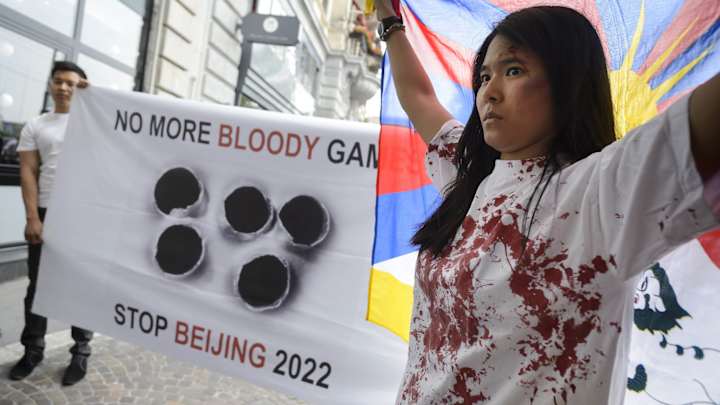 Tibetan activists enter hotel to protest Beijing's 2022 Winter Olympics bid