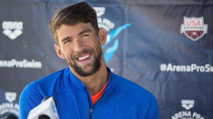 Michael Phelps grants wish of young swimmer battling cancer