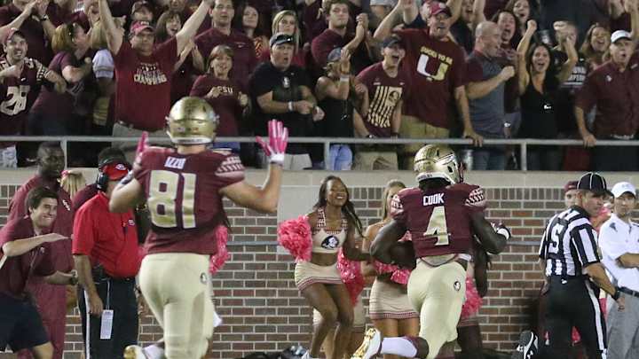 Cook runs for 222 yards, No. 12 Florida State beats Miami