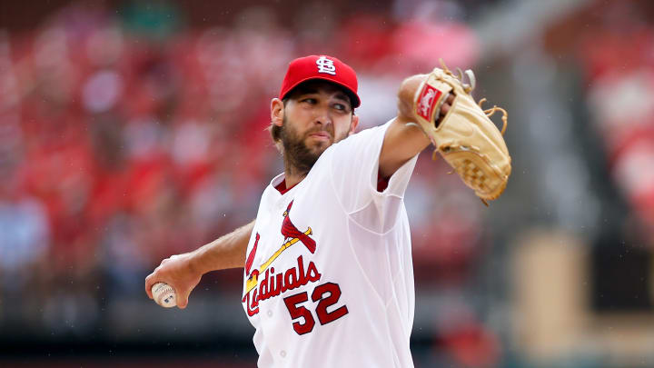 Cardinals play through rain, beat Twins 3-2 again