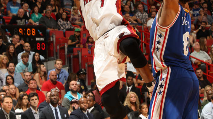 Heat escape, top 76ers 96-91 to keep Philly winless