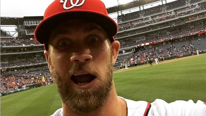 A fan threw her phone to Bryce Harper so he took a selfie A fan threw her phone to Bryce Harper so he took a selfie