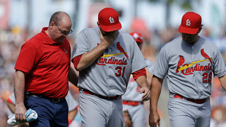 Lynn hurts ankle but beats Giants for 1st time, Cards win