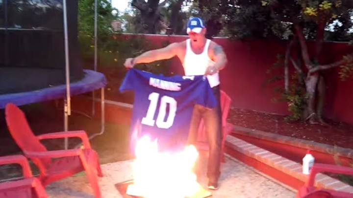 After one game, a Giants fan decided to burn Eli Manning's jersey